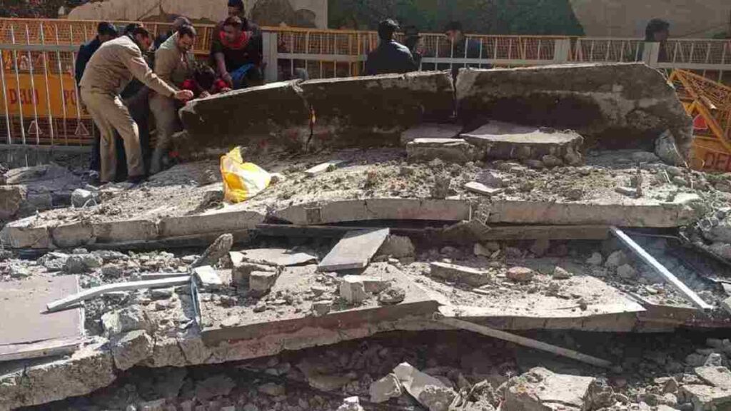 Debris scattered after wall collapse at Gokulpuri Metro Station.